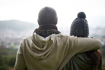Buy stock photo Nature view, hug and relax couple looking at city on hiking journey, travel adventure or mountain climbing. Morning wellness, love embrace or back of husband, wife or marriage people bonding together