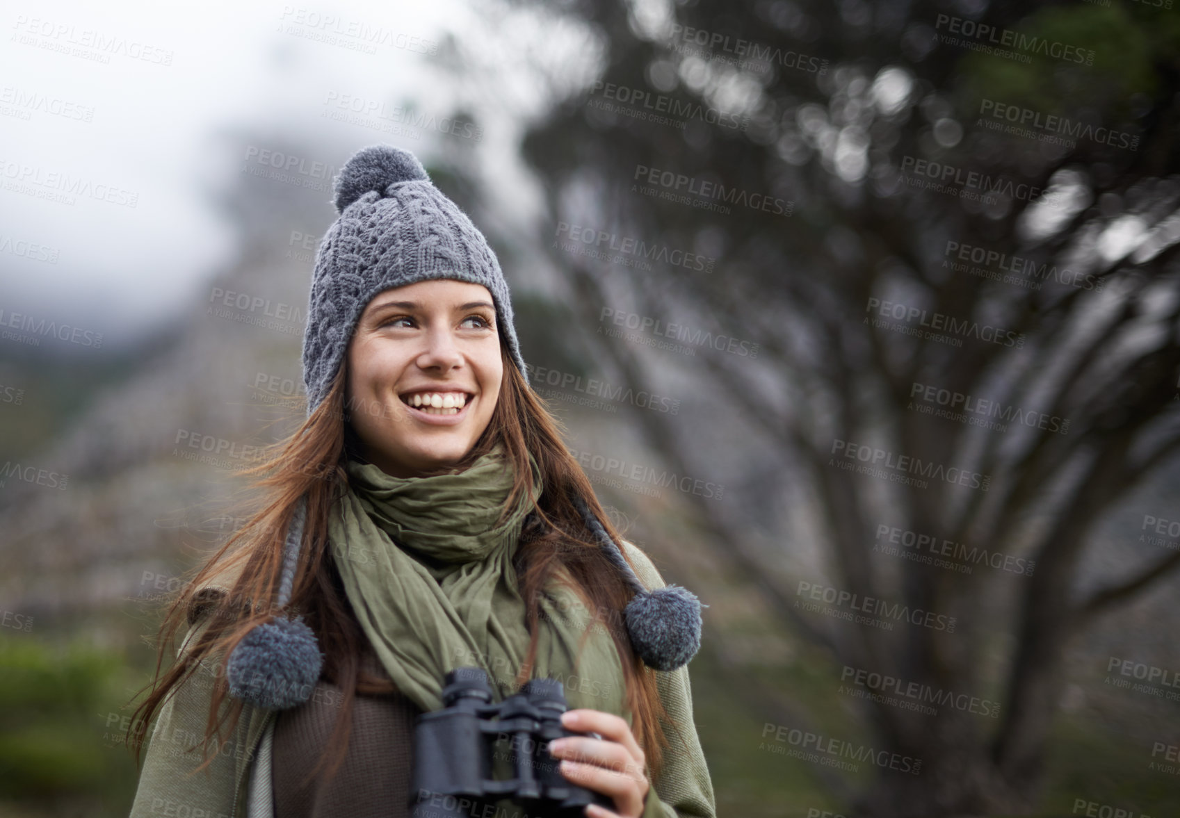 Buy stock photo Happiness, binocular and nature woman on hiking journey, travel adventure or relax walk. Mockup space, trekking woods and hiker smile for jungle exploration, bird watching and looking at outdoor view