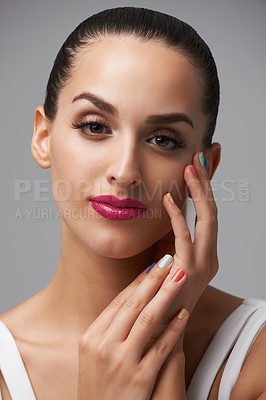 Buy stock photo Beauty salon, manicure hands and portrait of studio woman with facial cosmetics, skincare shine or creative design. Nail polish color, cosmetology and aesthetic person with makeup on grey background