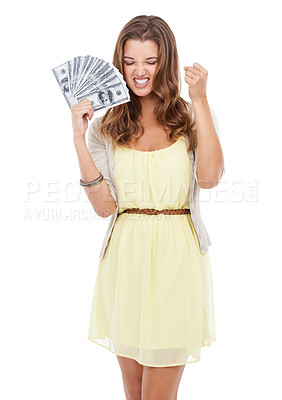 Buy stock photo Shot of a beautiful young woman holding money and gesturing with her hand as if in victory