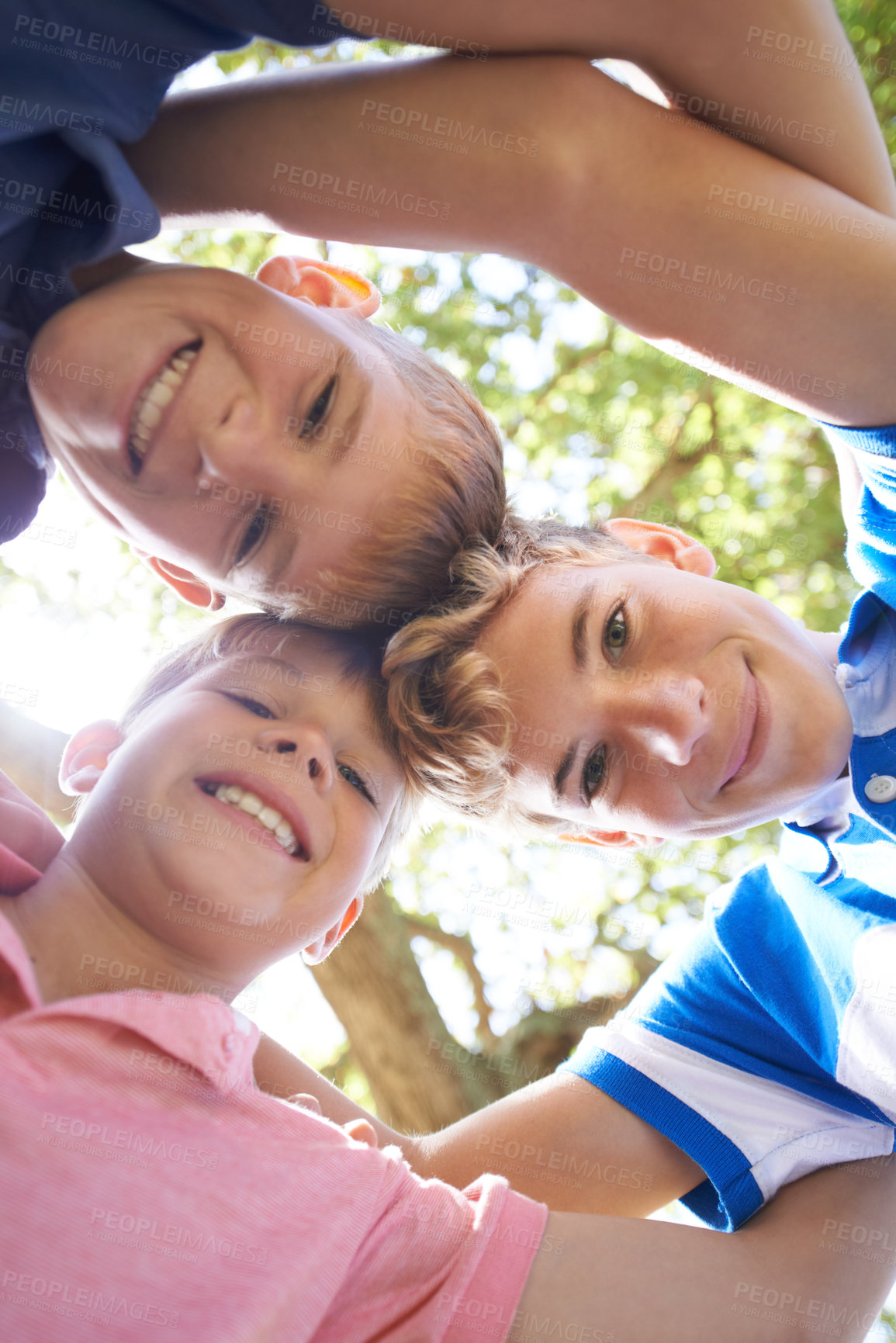 Buy stock photo Friends, children and huddle in nature portrait, brothers and care in childhood or smiling. Siblings, unity and solidarity on outdoors adventure, love and boys bonding below on vacation or holiday