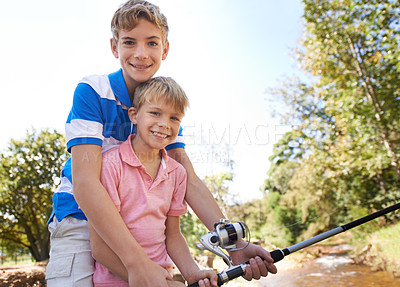 Buy stock photo Children, portrait and fishing rod for teaching at river for learning or adventure, summer or reel. Male person, brothers and equipment for trout lake catch together for vacation, holiday or hobby