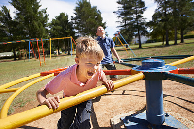 Buy stock photo A group of young boys sitting on a playground