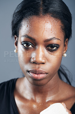 Buy stock photo Portrait, boxing and a woman sweating in studio on a gray background for self defense, fitness or training. Face, exercise and workout with a black female boxer practising for a fighting competition