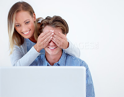 Buy stock photo Laptop, surprise and couple cover eyes in home for internet, online website and social networking. Happy, technology and man and woman on computer for relaxing, streaming subscription and remote work