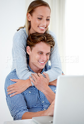 Buy stock photo Laptop, hug and couple in home for internet, online website and social networking. Happy, relationship and man and woman bonding on computer for streaming movies, remote work and relax together
