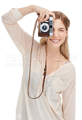 Buy stock photo Young photographer, camera and taking pictures in studio with happiness, talent and creative artist career. Woman, smile and photoshoot for professional production and focus lens by white background