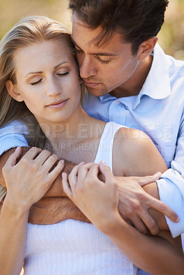 Buy stock photo Couple, hug and embrace in nature for bonding, love support for outdoor affection or comfort. Face of young woman and man in calm, peace or romance in forest or woods together for date or holiday