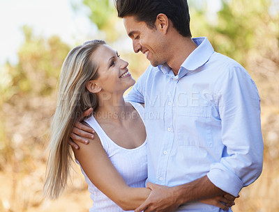 Buy stock photo Couple, face and happy or hug with travel in forest, nature or outdoor for holiday, vacation or trip. Romance, man and woman with embrace or smile for relationship, summer date or honeymoon with love