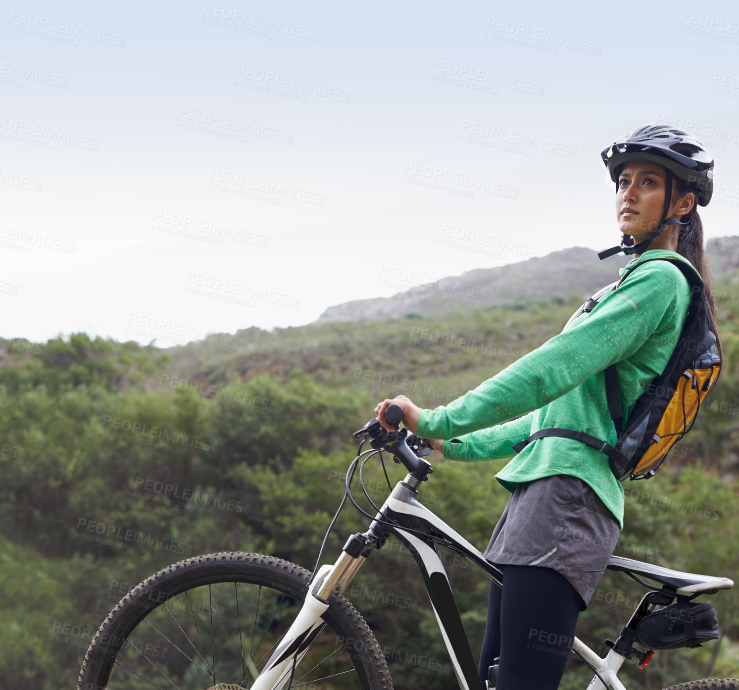Buy stock photo Woman, mountain bike and thinking in nature, fitness and helmet for safety, adventure and mock up space. Girl, bicycle and happy for training, race and outdoor challenge in countryside in Cape Town