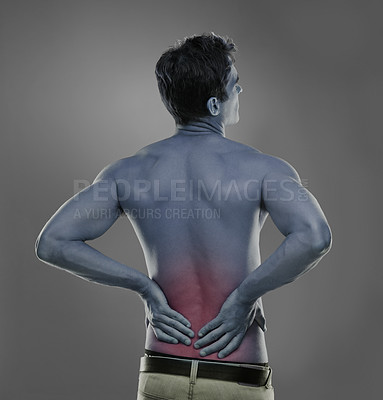 Buy stock photo Back pain, injury crisis and studio man with medical emergency, sore spine or fibromyalgia. Backache, red glow and person massage joint ache, inflammation or bad muscle strain on grey background