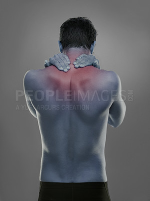 Buy stock photo Back, man and red highlight for neck pain, injury and muscle tension on a grey studio background. Person, guy and model with inflammation and body ache with bruise and broken with strain and burnout