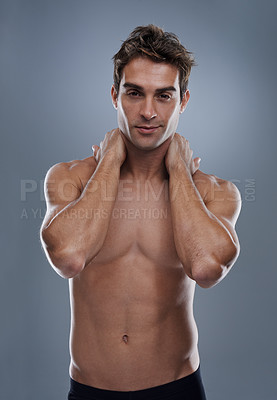 Buy stock photo Man, shirtless and portrait with confidence in studio or grey background with muscles for fitness, wellness or body care. Male person, model and topless with mockup space for stomach, exercise or abs