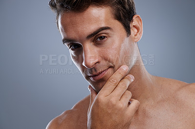 Buy stock photo Portrait, shaving and man with skincare, cosmetics and dermatology on grey studio background. Face, person or model with grooming routine or healthy skin with treatment, shine or confident with glow