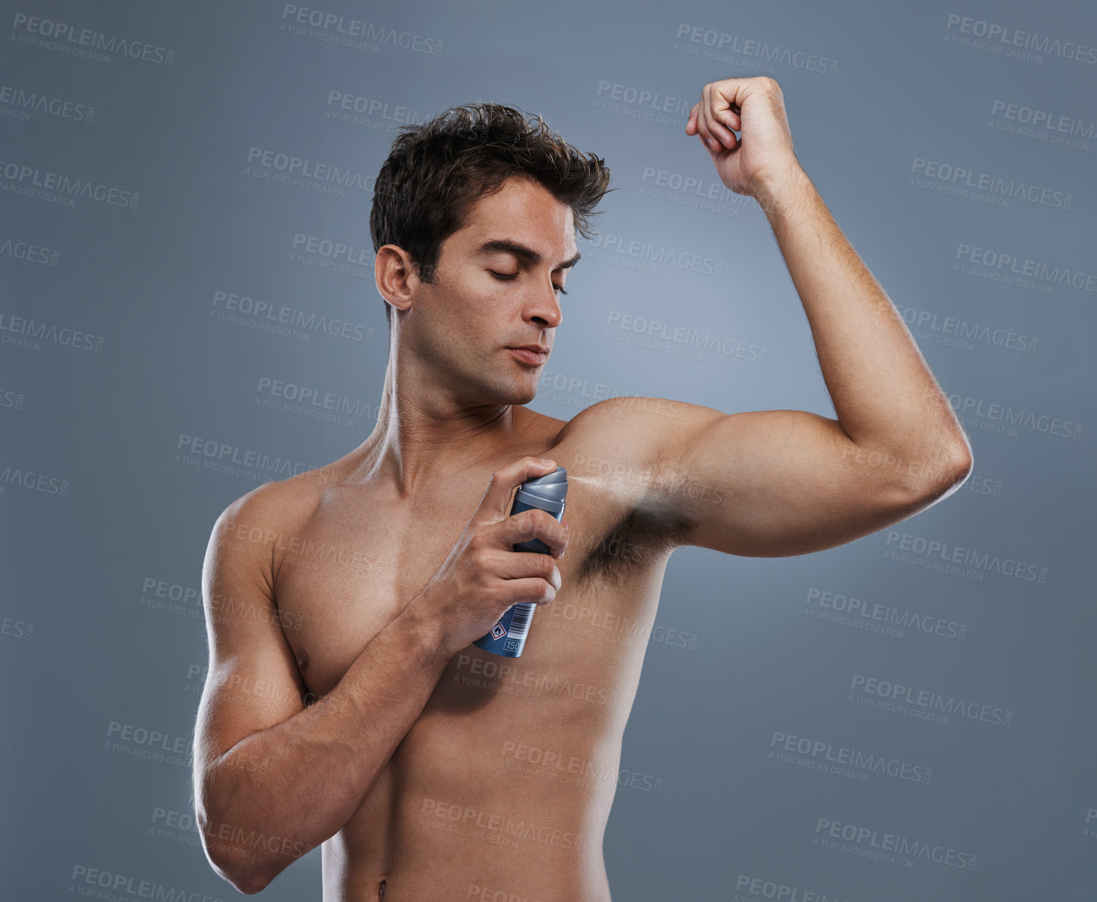 Buy stock photo Man, deodorant and spray for armpit or smell in studio or product application for clean odor, hygiene or grey background. Male person, topless and confidence or health wellness, care or mockup space