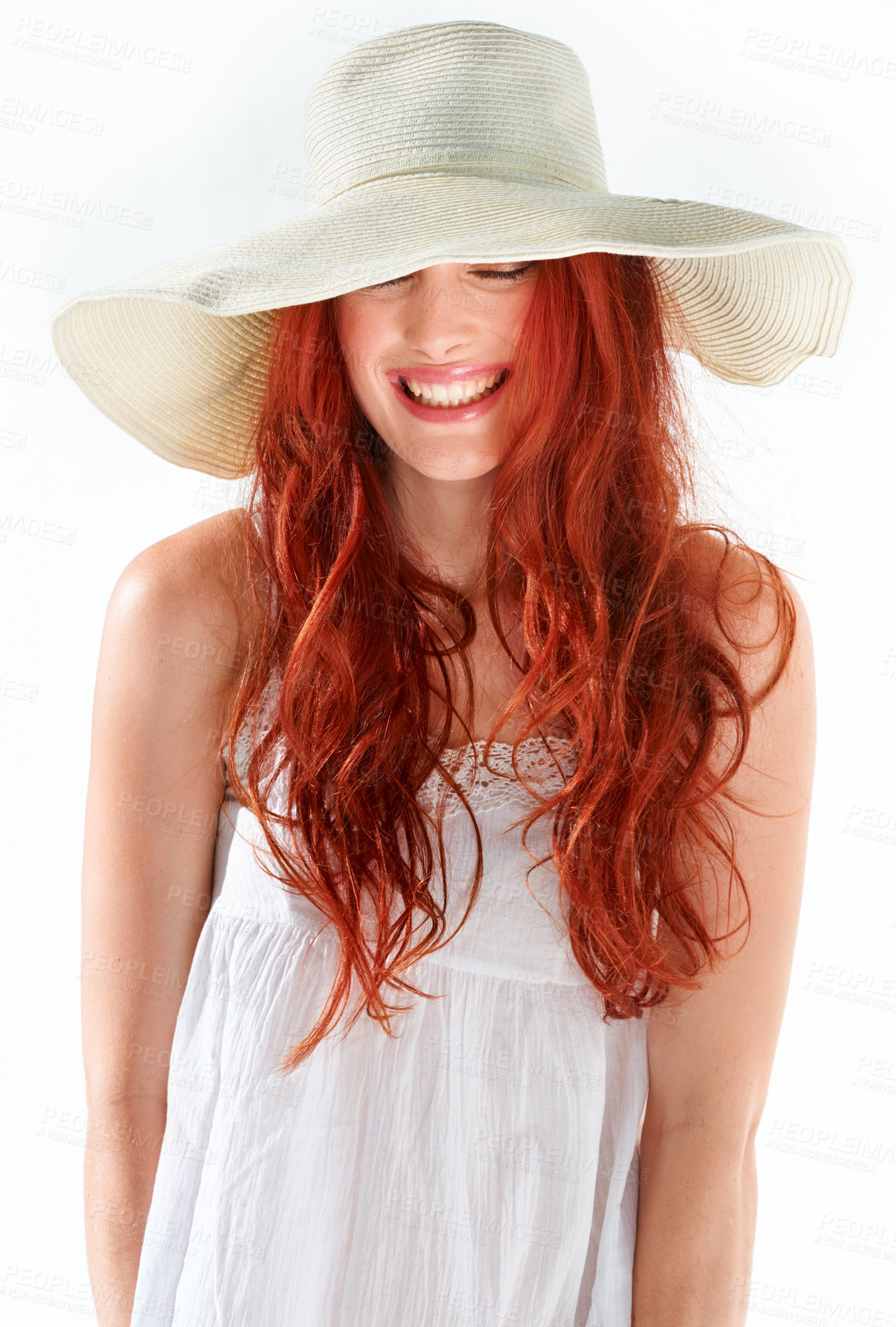 Buy stock photo Woman, face and smile with straw hat in studio, isolated white background and beautiful style. Happy female model, eyes closed and red hair with cool summer accessory, fashion and beauty of happiness
