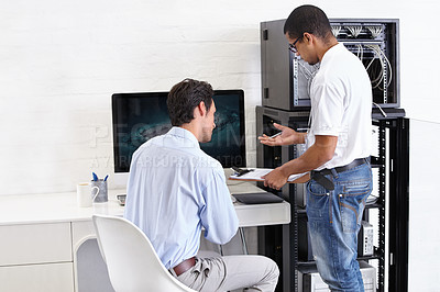 Buy stock photo Server room, man or technician with clipboard talking to a client about cyber security glitch or hardware. Network, database or contract with a male engineer speaking of information technology help