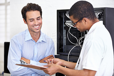 Buy stock photo Server room, happy man or technician speaking of hardware maintenance or glitch in business office. Network, tech support or worker with electrician or electrical engineer for information technology