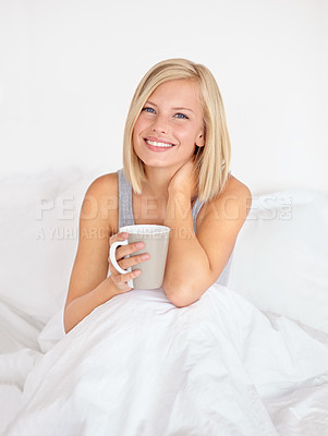 Buy stock photo Woman, portrait and coffee in bedroom for morning relax or home beverage for comfort, peace or happy. Female person, face and smile or drinking mug on duvet or warm caffeine for vacation, rest or tea