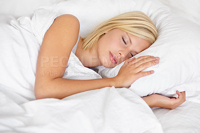 Buy stock photo Woman, bedroom and sleeping with rest, tired and dreaming in bed, resting and Apartment in morning. Relax, blanket and eyes closed on pillow, young female asleep in house on weekend with fatigue