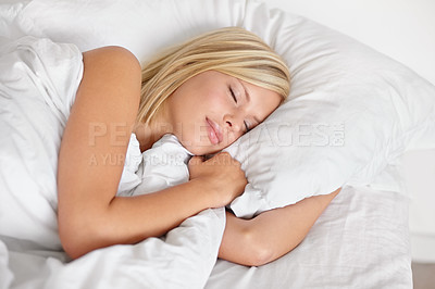 Buy stock photo Woman, bed and sleeping with face, relax and dreaming in bedroom, resting and Apartment in morning. Tired, blanket and eyes closed on pillow, young female asleep in house on weekend with fatigue