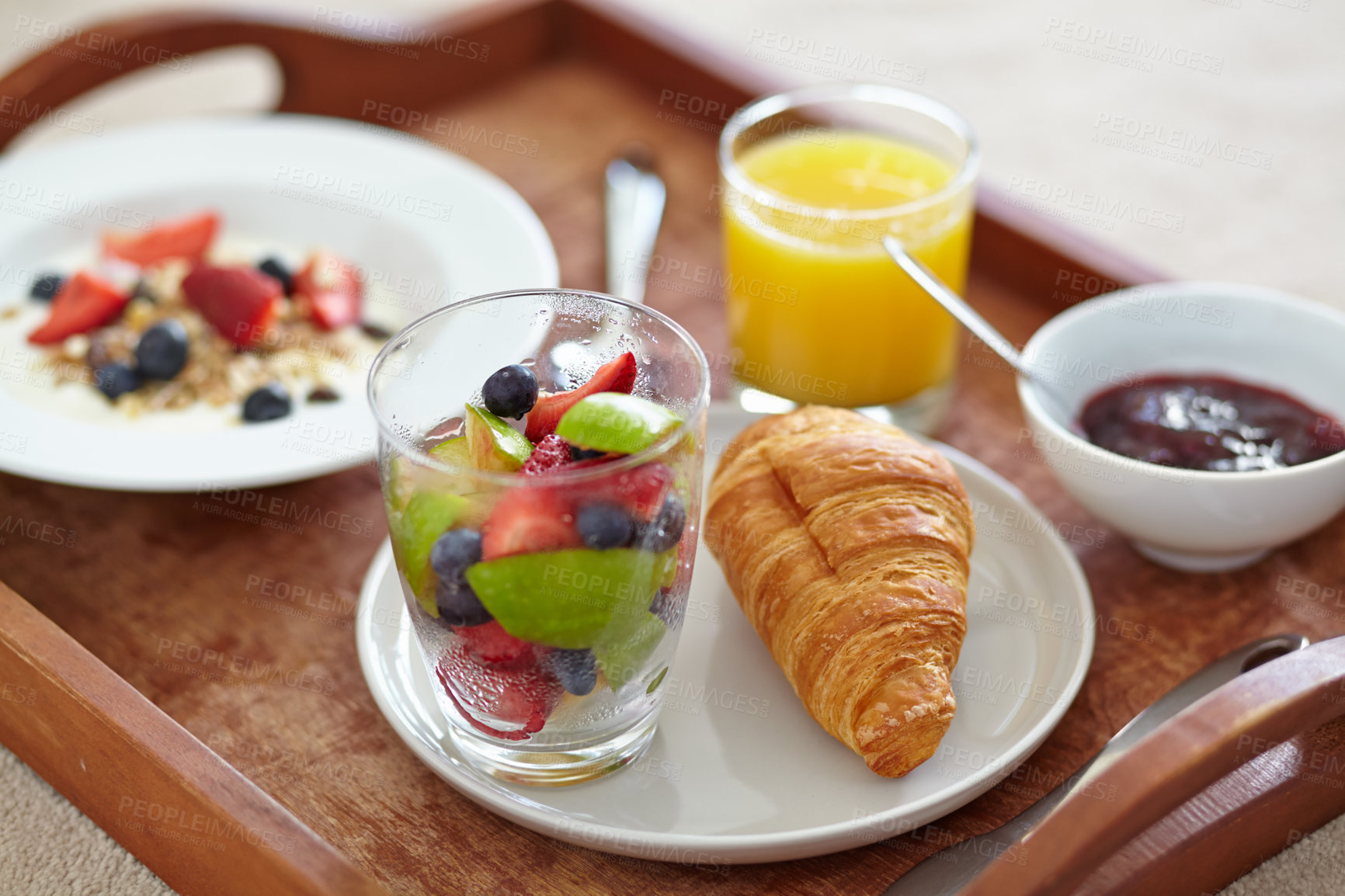 Buy stock photo Wellness, closeup and breakfast food tray with fruit for balance, benefits or gut health. Muesli, zoom and croissant with vitamins for diet, nutrition or healthy eating, brunch or superfoods salad