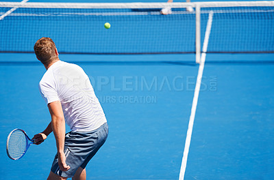 Buy stock photo Sport, man and tennis on court with serve, competition and performance outdoor with fitness and energy. Athlete, player and ball on turf for training, exercise and racket with skill, game and hobby