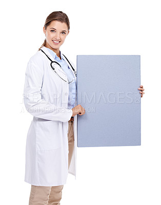 Buy stock photo Poster, sign and happy portrait of doctor in white background, studio and mock up space. Medical, information and woman with board, presentation and paper for news in healthcare, hospital or clinic