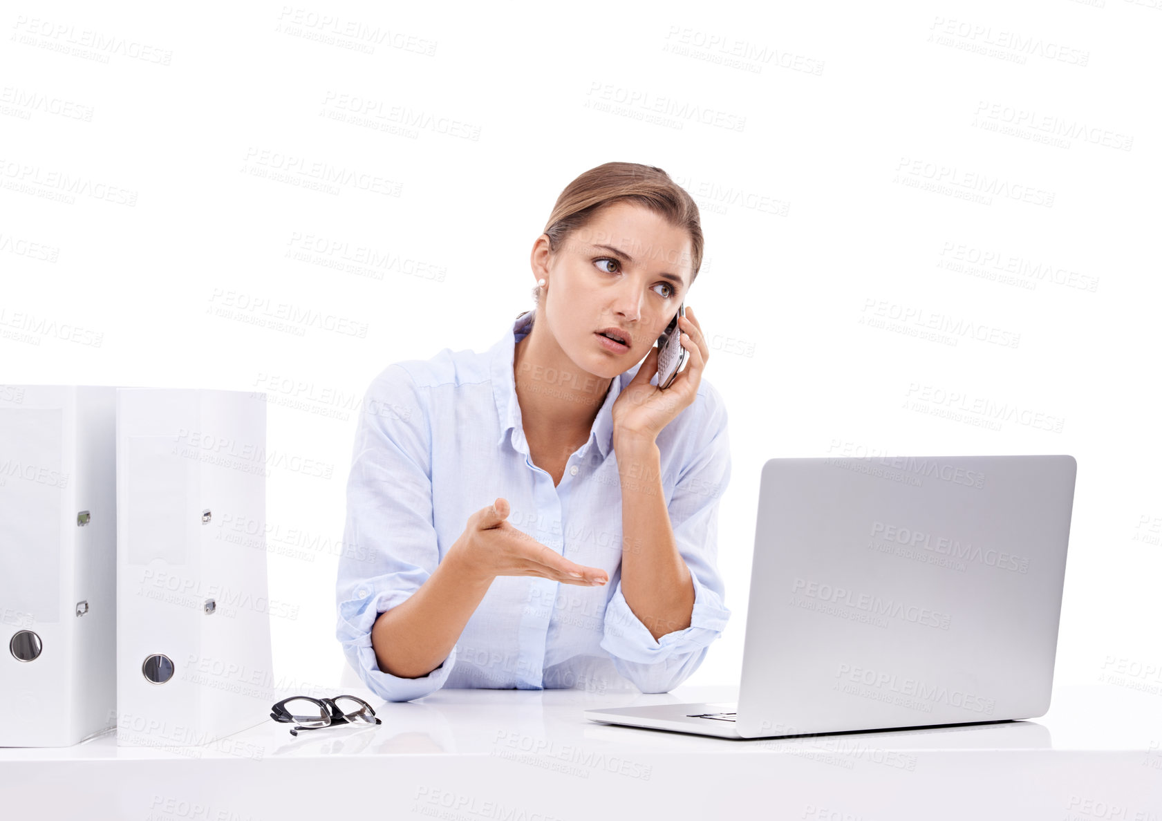 Buy stock photo Laptop, stress and woman on a phone call in studio for appointment information at secretary desk. Communication, upset and female receptionist on mobile conversation with computer by white background