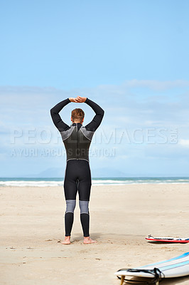 Buy stock photo Surfing, stretching and man with surfboard on beach for water sports training, freedom and fitness outdoors. Nature, exercise and person warm up for adventure on holiday, vacation and hobby by sea
