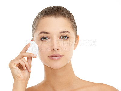 Buy stock photo Face, skincare or cotton pad for woman in studio for wellness, shine or glow on white background. Cleaning, portrait or model with facial swab for makeup, removal and toner, application or skin detox