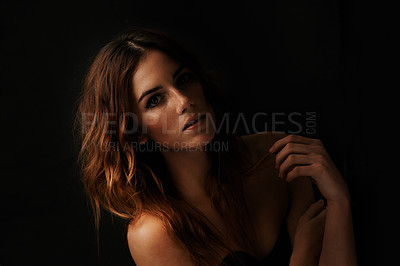 Buy stock photo Woman, hair care and ginger with portrait, shadow and shampoo treatment in a studio. Relax, beauty and female person with wavy texture and fresh haircut with balayage coloring with black background