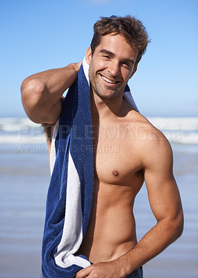 Buy stock photo Smile, beach and portrait of man with towel for swimming in ocean on vacation, holiday or adventure. Happy, handsome and young male person by sea with confidence for summer weekend trip in Australia.