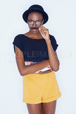 Buy stock photo Funny, black woman and portrait with mustache in studio with hipster fashion and creative model in background. Silly, nerd and geek with goofy style and joke with trendy hat or unique outfit