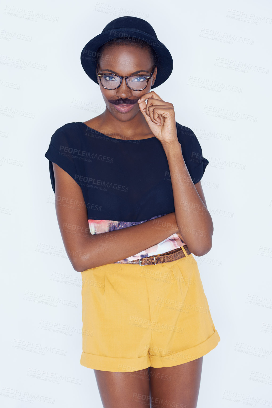 Buy stock photo Funny, black woman and portrait with mustache in studio with hipster fashion and creative model in background. Silly, nerd and geek with goofy style and joke with trendy hat or unique outfit