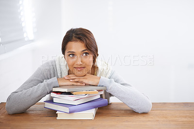 Buy stock photo Student, happy and thinking with books by desk, idea and learning for research of assignment. Young woman, indian and positive by notebook on scholarship, studies and planning for university by table