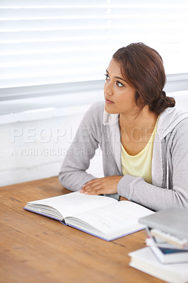 Student, woman and thinking with books for study, knowledge or education with idea for learning in bedroom. Young person, girl and thoughtful at desk with novel for scholarship, project or assessment