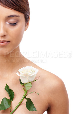 Buy stock photo Woman, rose and makeup with eyes closed, beauty and model for skincare cosmetics on white background. Dermatology, wellness and mockup space with shine, flower or organic for glow with healthy skin