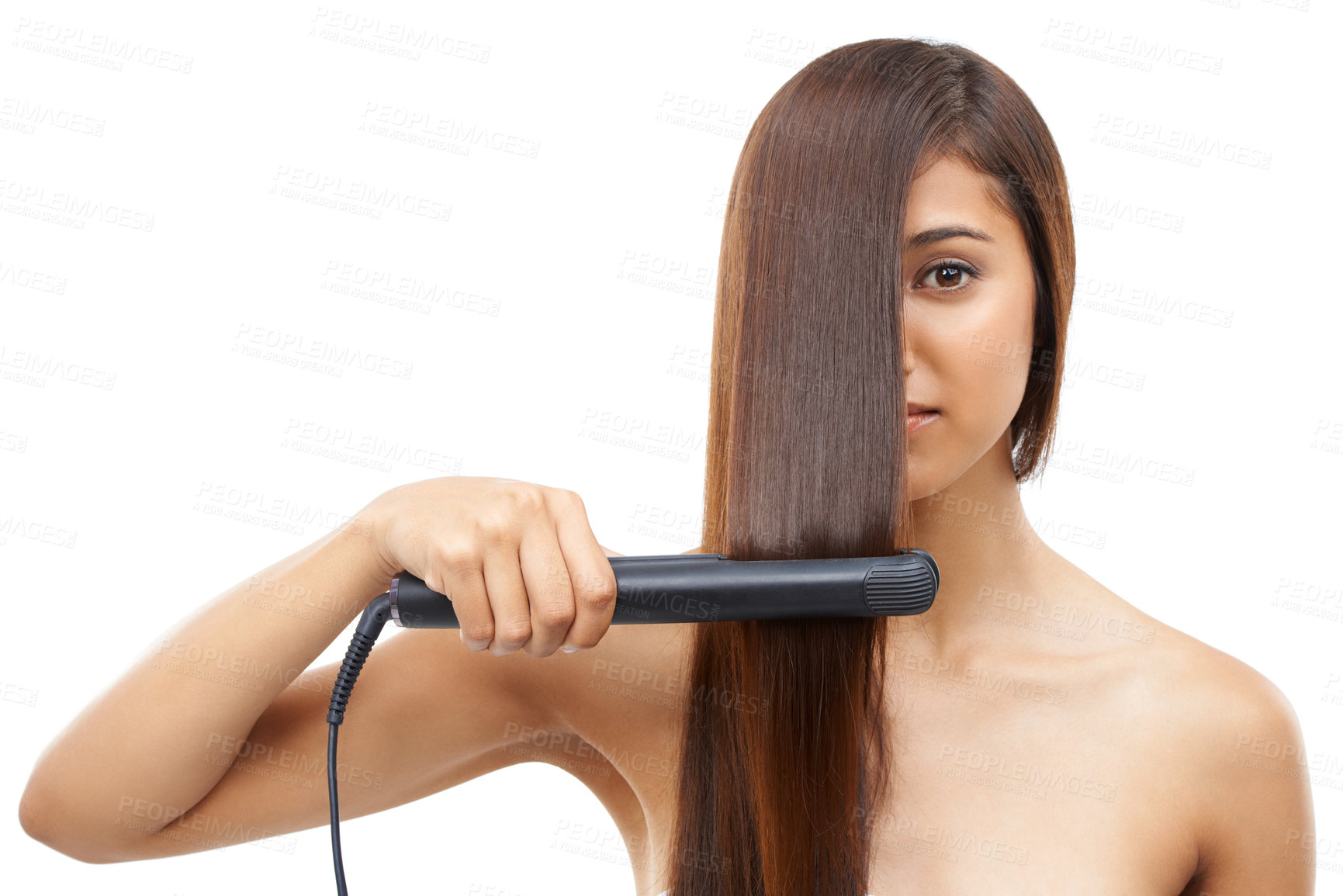 Buy stock photo Hair care, straightener and young woman in studio for cosmetic, salon and beauty treatment. Flat iron tool, confident and portrait of female person with healthy hairstyle routine by white background.
