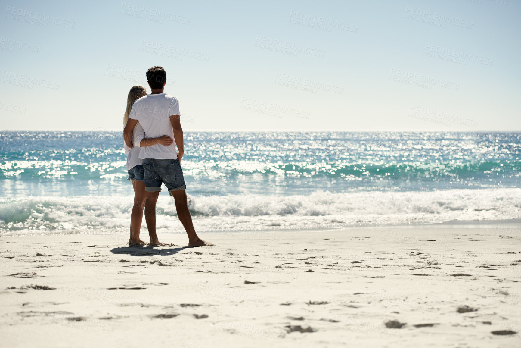 Buy stock photo Beach, back and couple hug in nature with freedom, romance and care, trust and support. Love, embrace and people at the sea for travel, fun and summer, vacation or adventure while bonding in Florida