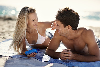 Buy stock photo Beach, relax happy couple and apply sunscreen for facial care hydration, wellness or skincare UV protection. Summer, holiday and sun cream application for skin safety, solar security or SPF sunblock