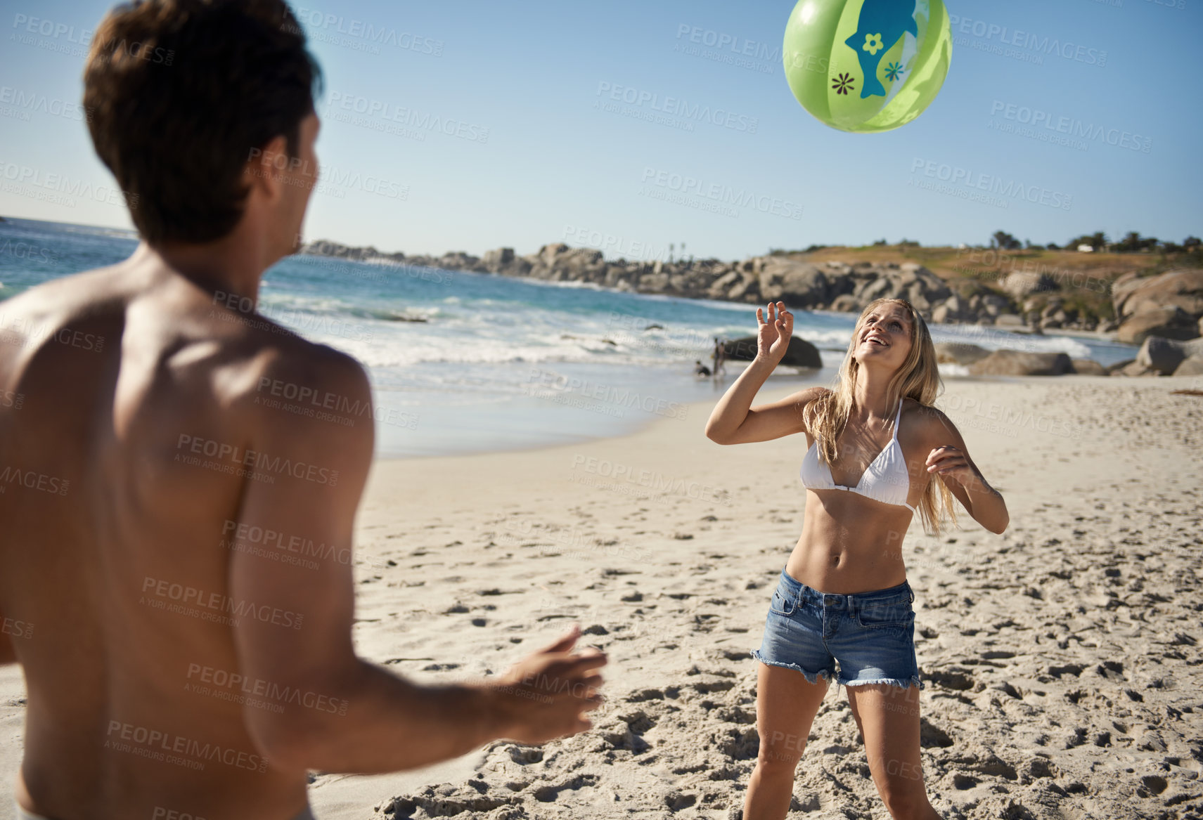 Buy stock photo Couple, ball playing and fun by beach in summer with love, care and support together on a holiday. Happy, vacation and date by the sea in Miami with freedom and travel by the ocean on a trip outdoor