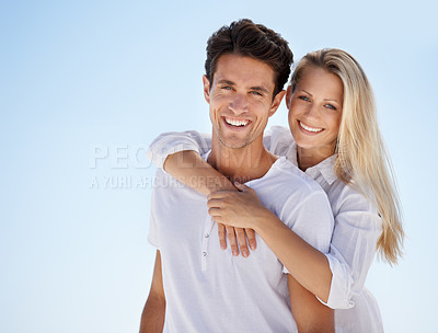 Buy stock photo Portrait, embrace and happy couple on blue sky for date, outdoor bonding and tropical holiday. Romance, man and woman in nature, hugging and relax on vacation together with travel, care and adventure