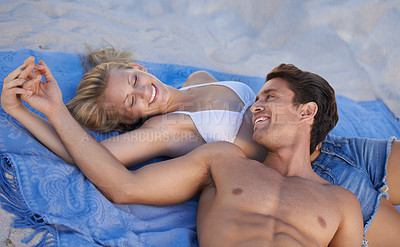 Buy stock photo Love, holding hands and happy couple lying on beach for date, outdoor bonding or tropical holiday. Romance, man and woman, peace and relax on ocean vacation together with travel, care and adventure