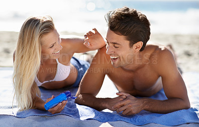 Buy stock photo Beach couple, smile and apply sunscreen for face care hydration, wellness or skincare UV protection on tropical island. Sun cream application for boyfriend skin safety, solar security or SPF sunblock