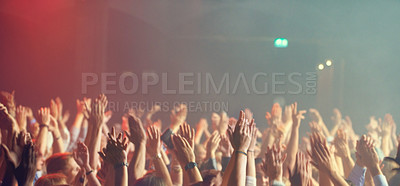 Buy stock photo A crowd of people celebrating and partying with their hands in the air to an awesome band. This concert was created for the sole purpose of this photo shoot, featuring 300 models and 3 live bands. All people in this shoot are model released.