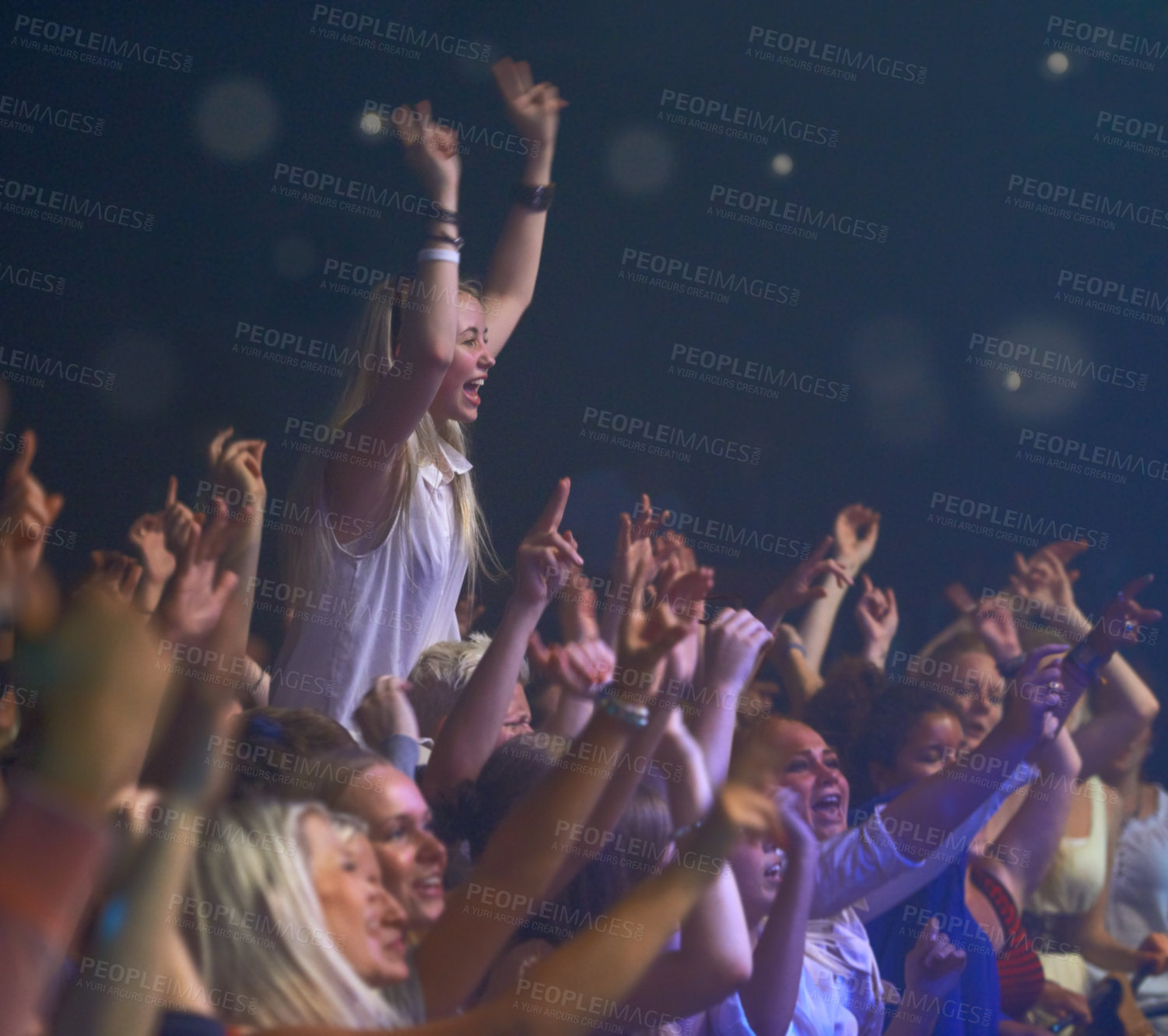 Buy stock photo Concert, audience and music with happy woman in group at dj, band and festival event at a stage with lights. Rock show, dance and party with excited crowd with rave, techno and entertainment at venue