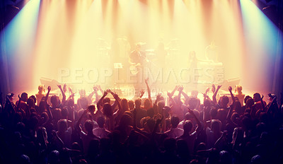Buy stock photo Shot of a crowd at a music concert. This concert was created for the sole purpose of this photo shoot, featuring 300 models and 3 live bands. All people in this shoot are model released.
