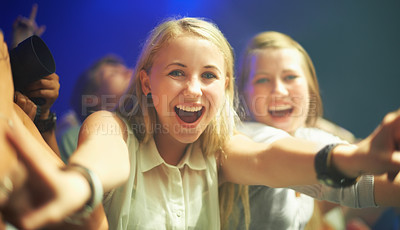 Buy stock photo Friends, happy or selfie at concert in portrait, bonding or excited for social fun at music festival. Women, together or smile on face at live show, event or celebration in crowd at disco performance