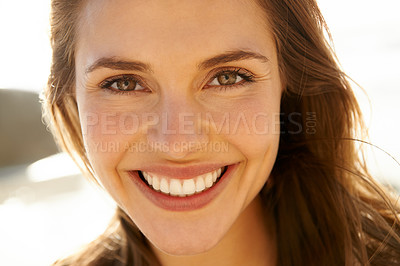 Buy stock photo Portrait, smile and woman on beach at sunset for travel, tropical vacation or island holiday closeup. Face, summer and nature with happy young tourist outdoor on coast by sea or ocean in paradise